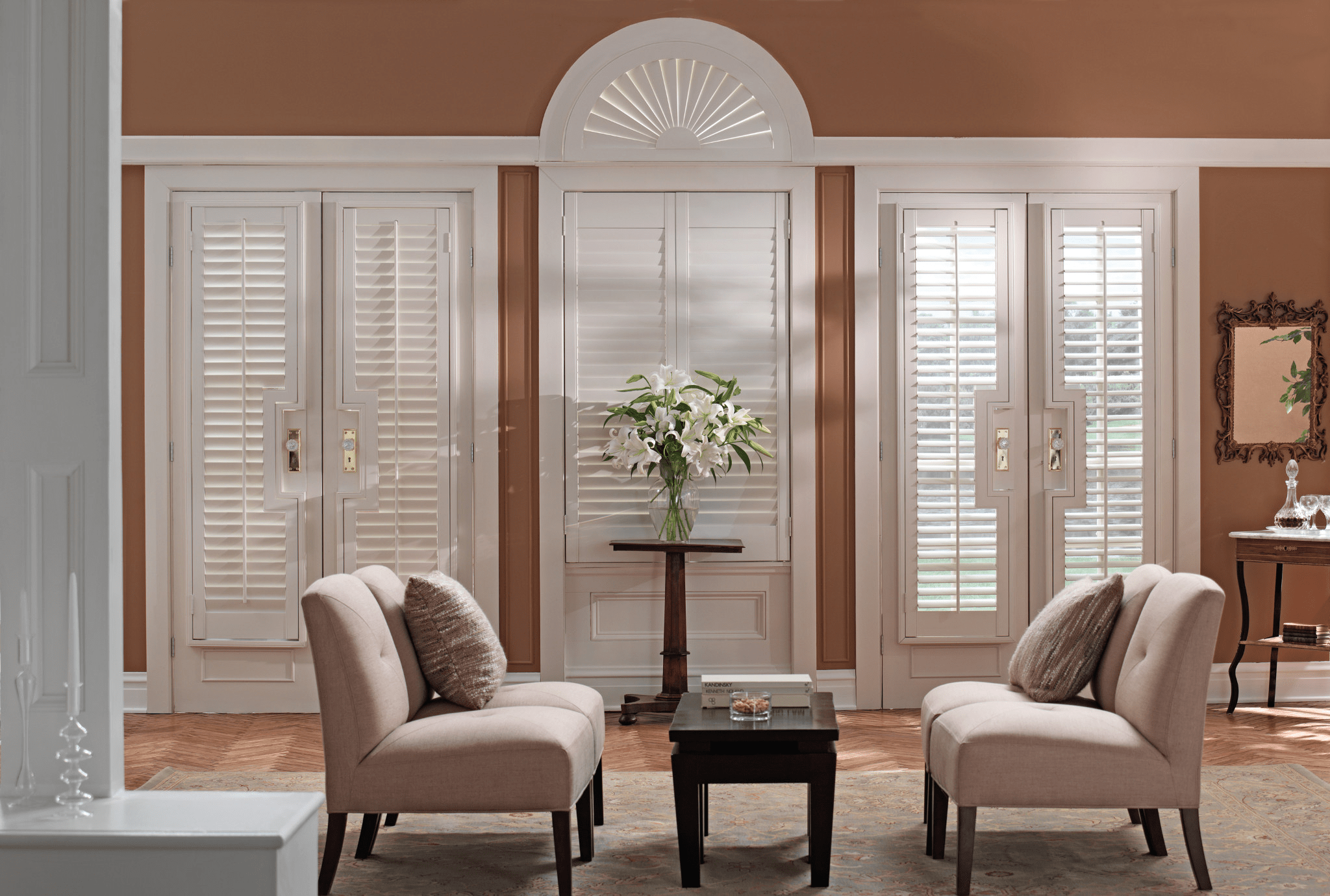 Plantation shutters with open louvers in a sunlit room