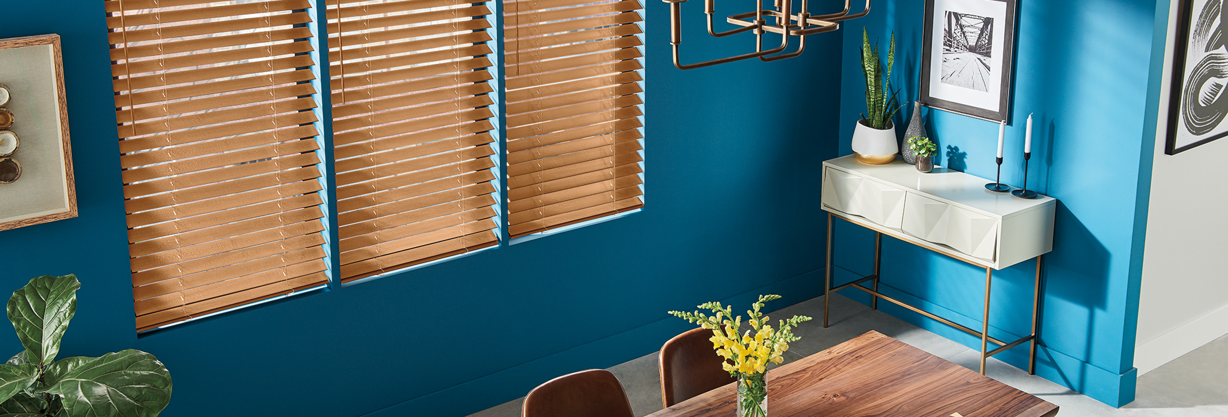 Graber wood blinds with rich warm finish in a bedroom