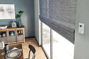 Graber drapery and shades layered on a window